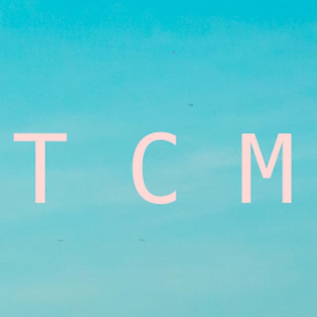 T C M